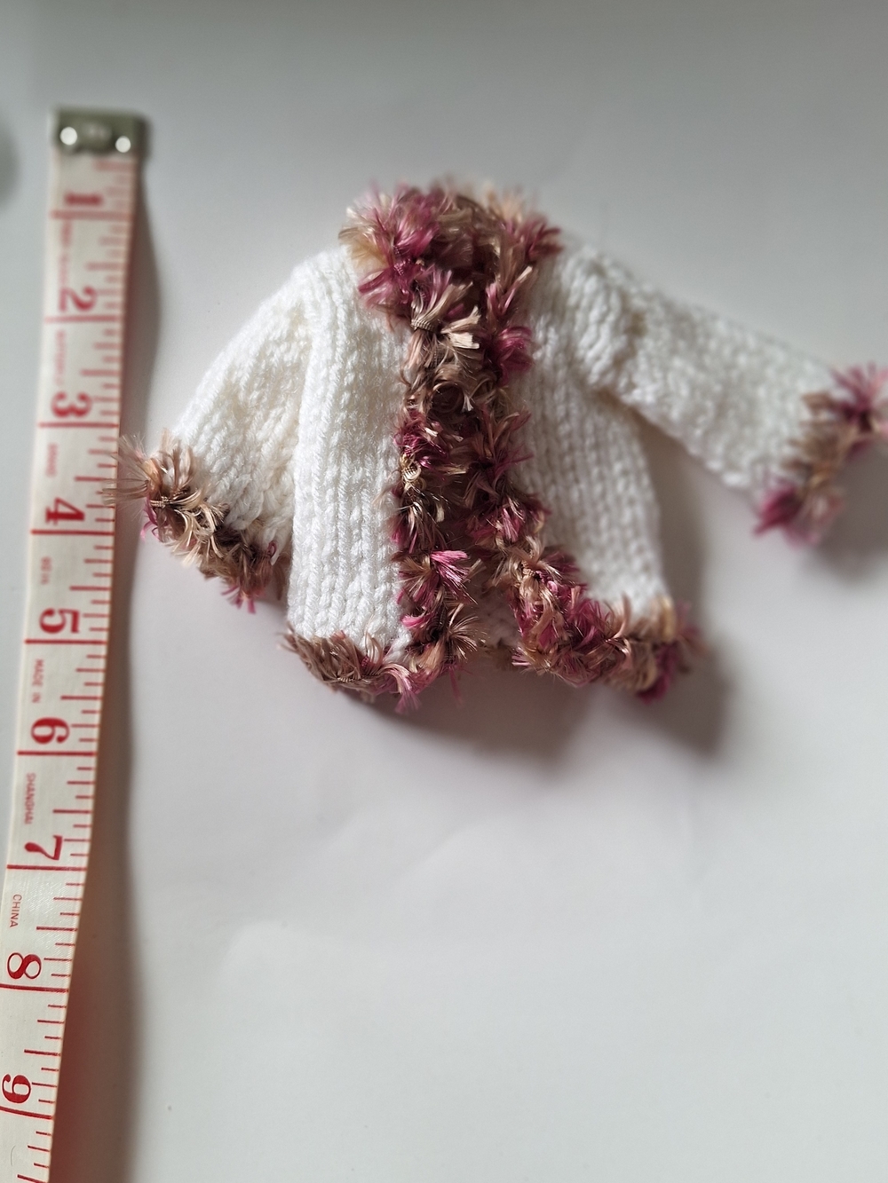 White Doll Sweater with Pink & Brown Faux Fur Trim